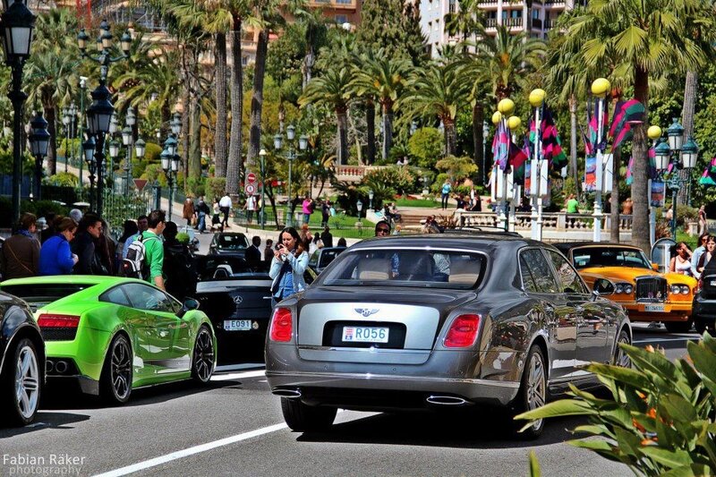 Luxury cars on a city street