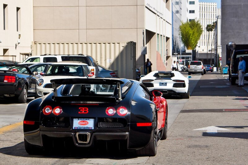 Luxury cars on a city street