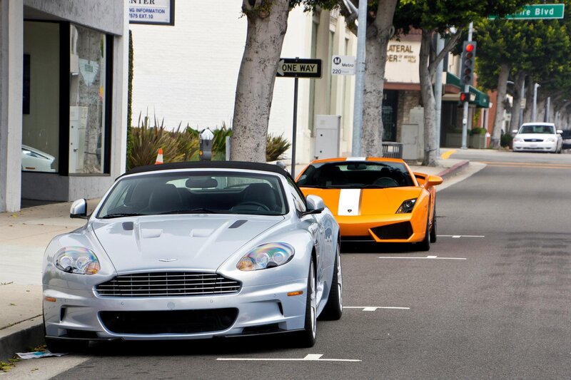 Luxury cars on a city street