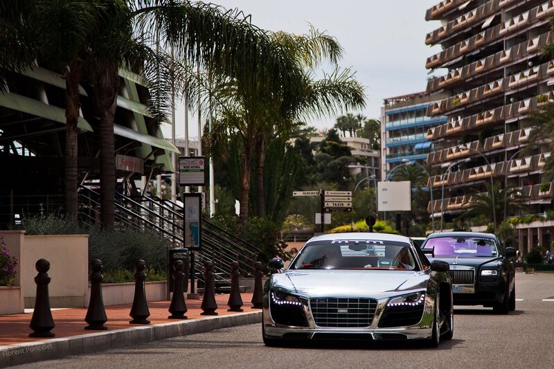 Luxury cars on a city street