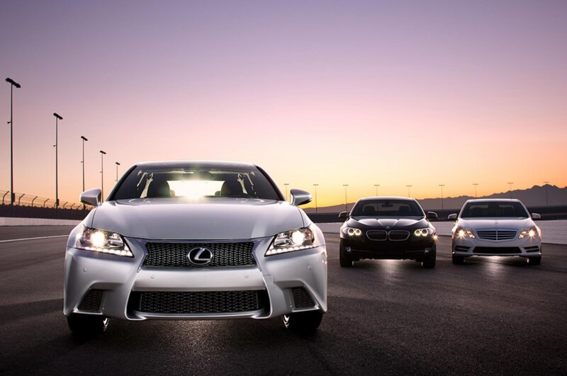 Luxury cars on a racetrack