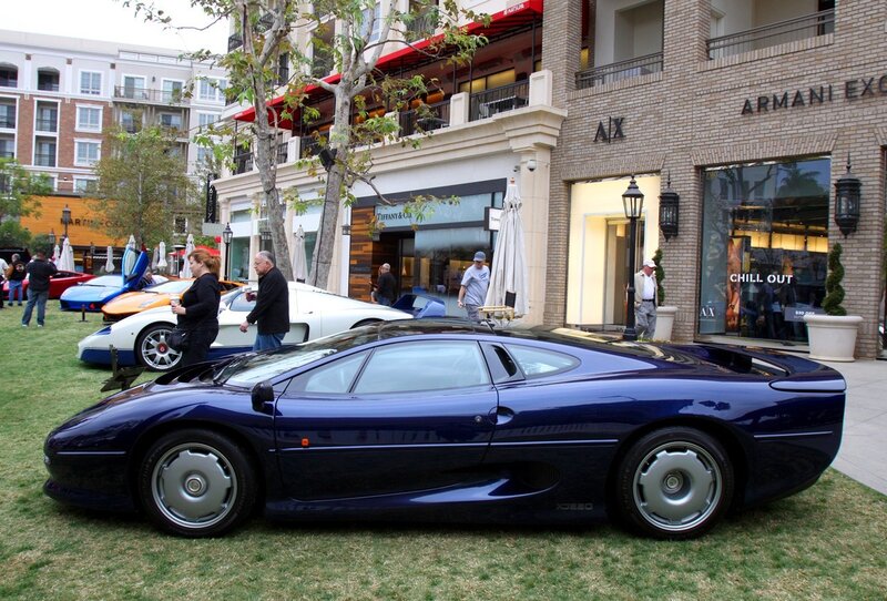 Luxury cars on display at a show
