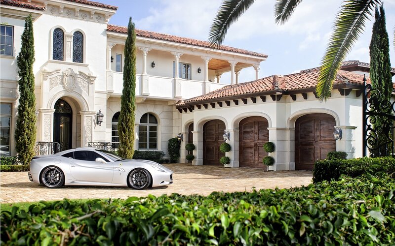 Luxury home with sports car