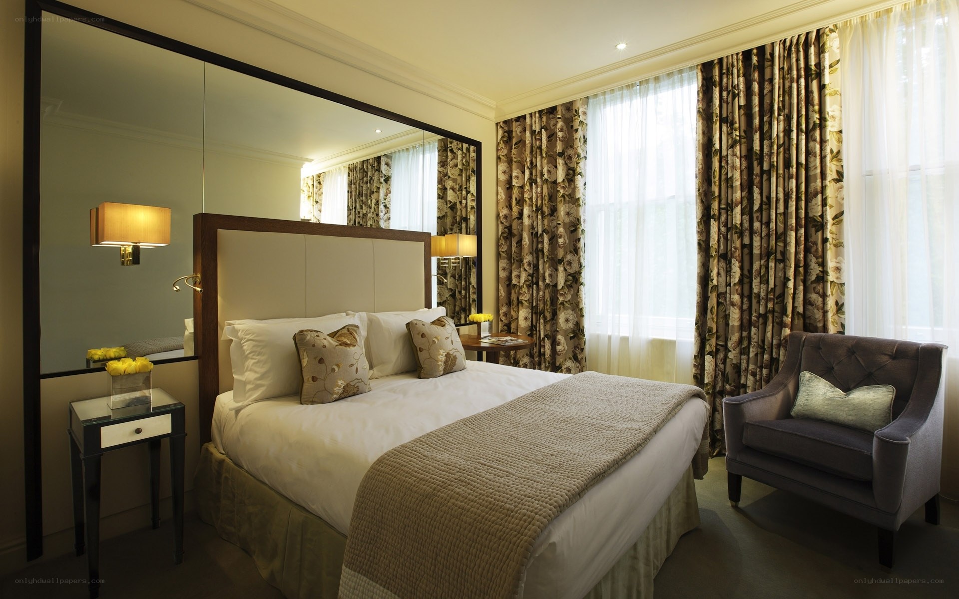Luxury hotel bedroom with mirror