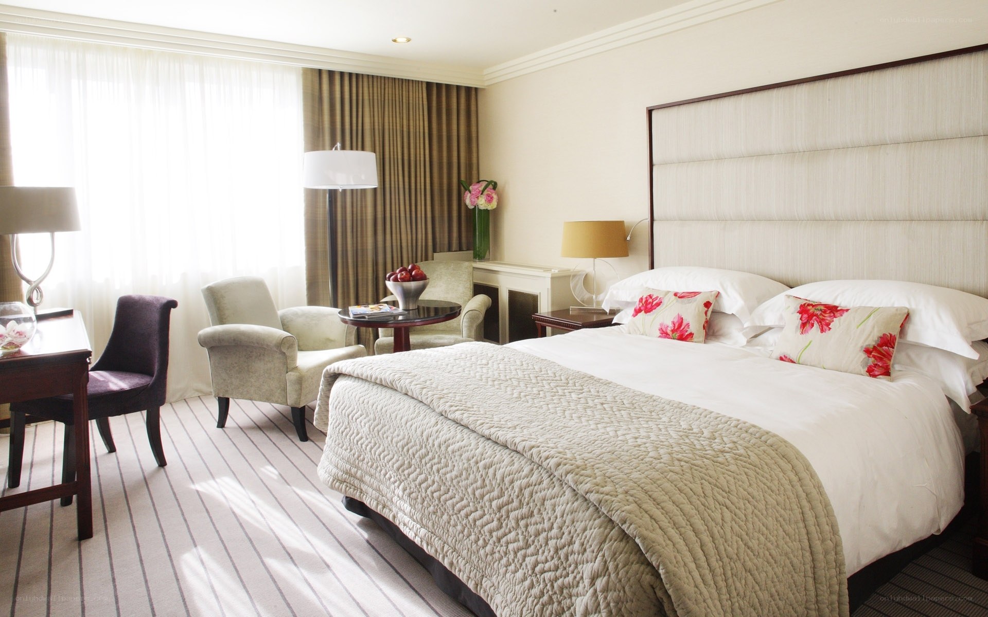 Luxury hotel room with bed and seating