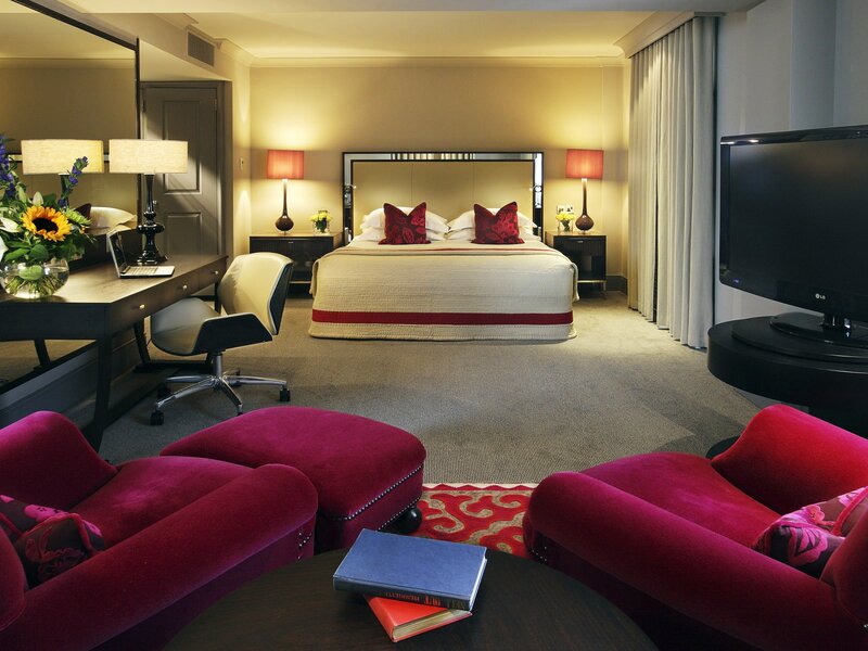 Luxury hotel room with red accents