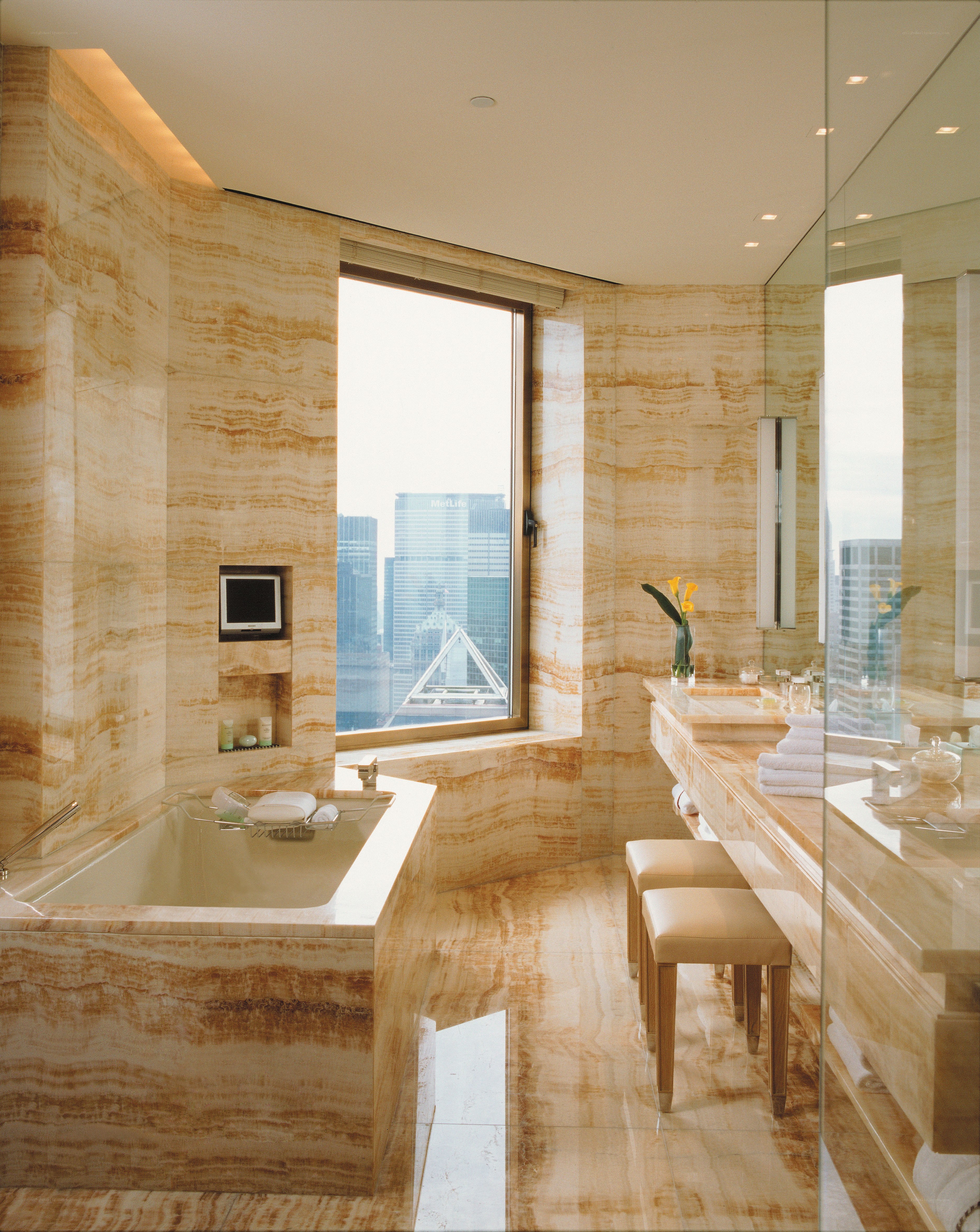 Luxury marble bathroom with city view