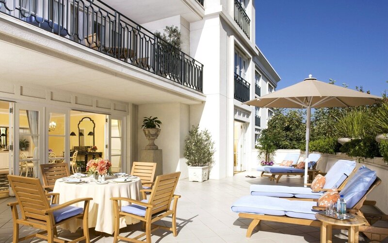 Luxury outdoor patio with dining and lounging