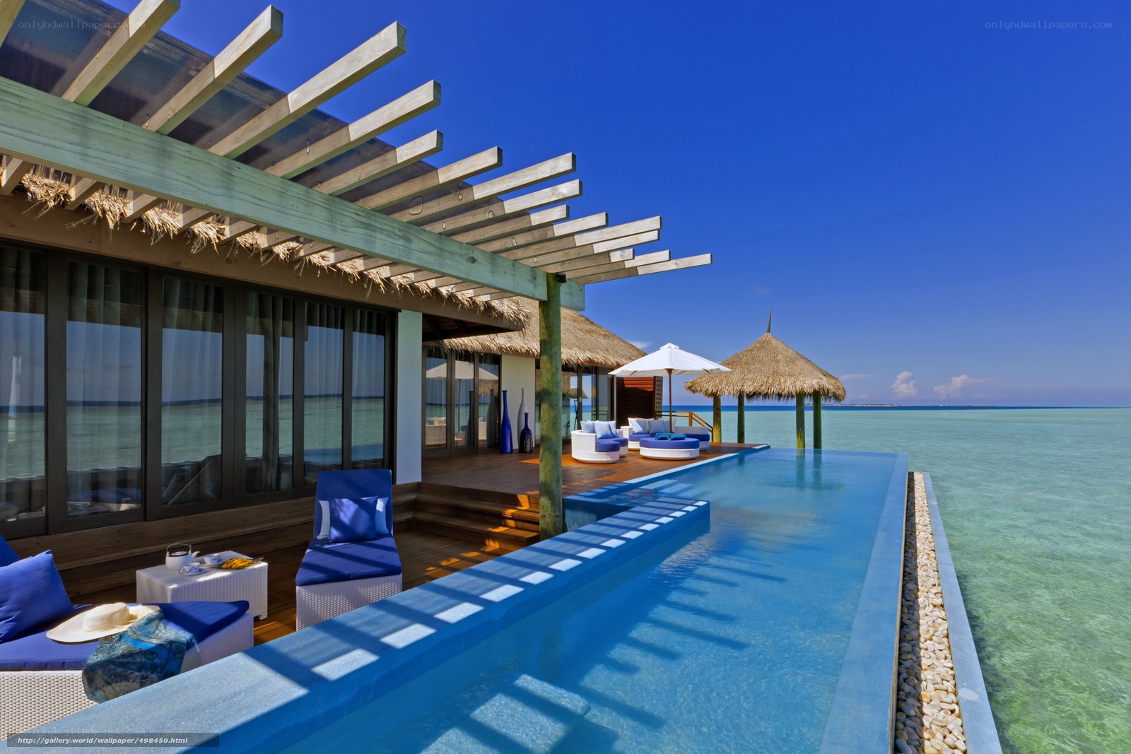 Luxury overwater villa with infinity pool