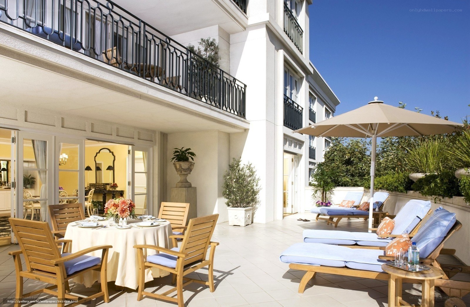 Luxury patio with dining and lounging