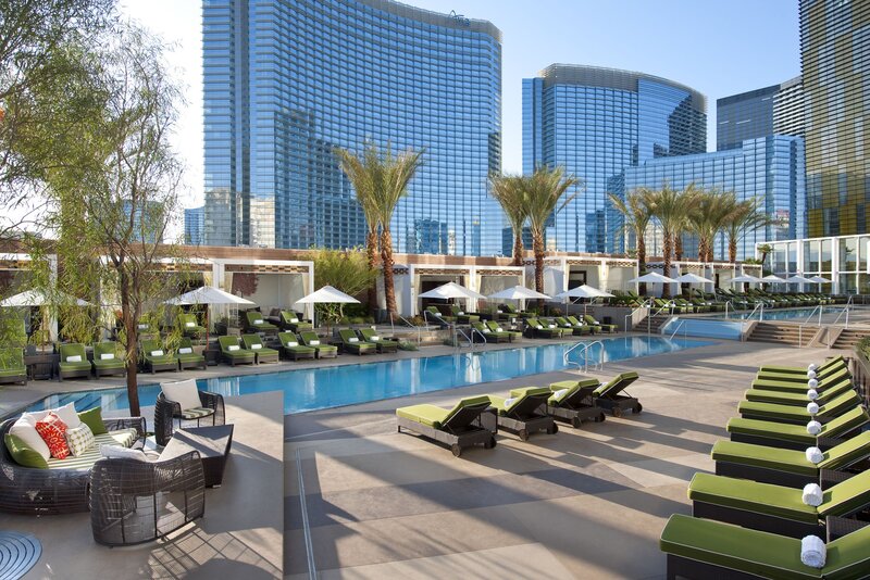Luxury pool area with city skyline