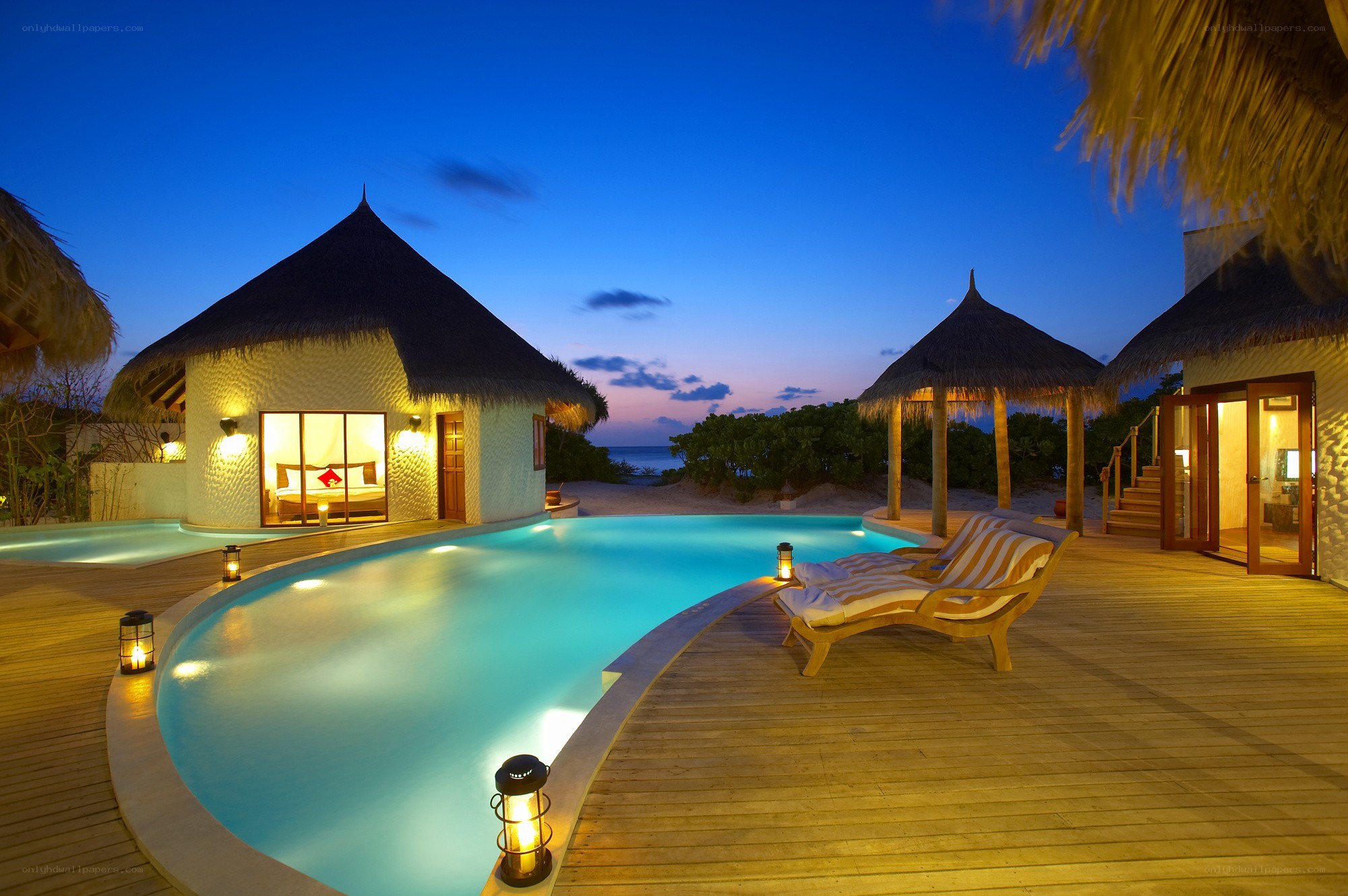 Luxury pool villa at dusk
