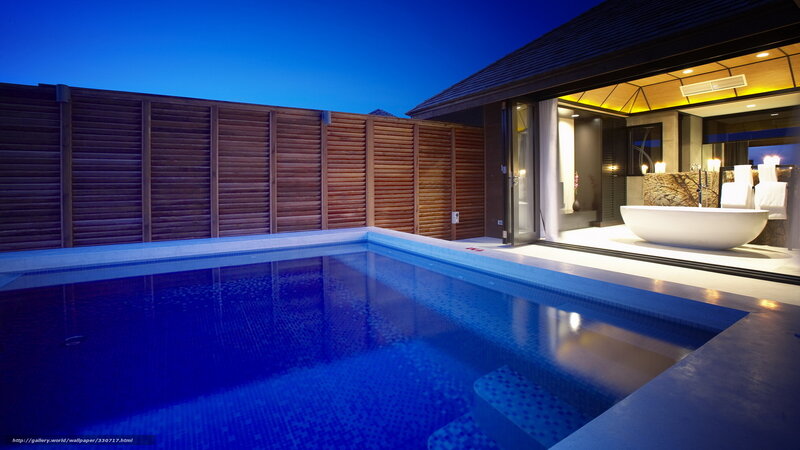 Luxury pool villa at dusk