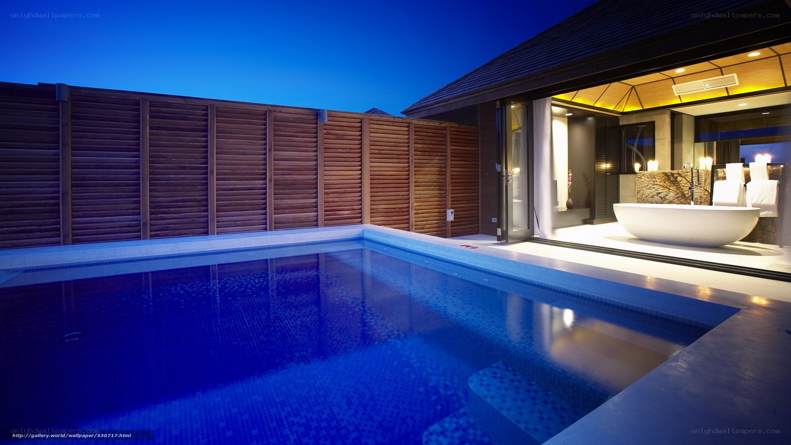 Luxury pool villa at dusk