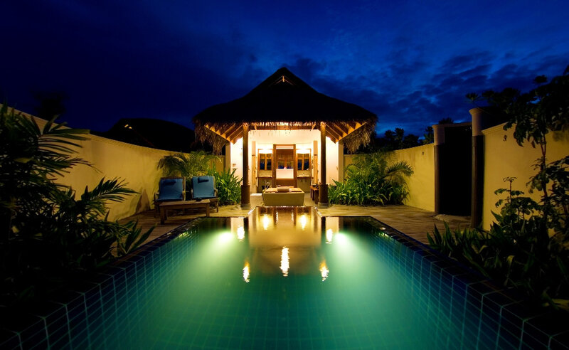 Luxury pool villa at night
