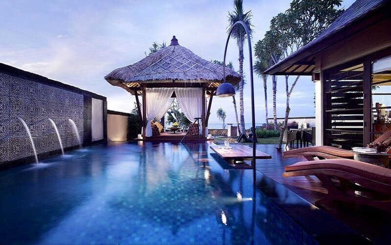 Luxury pool with thatched gazebo