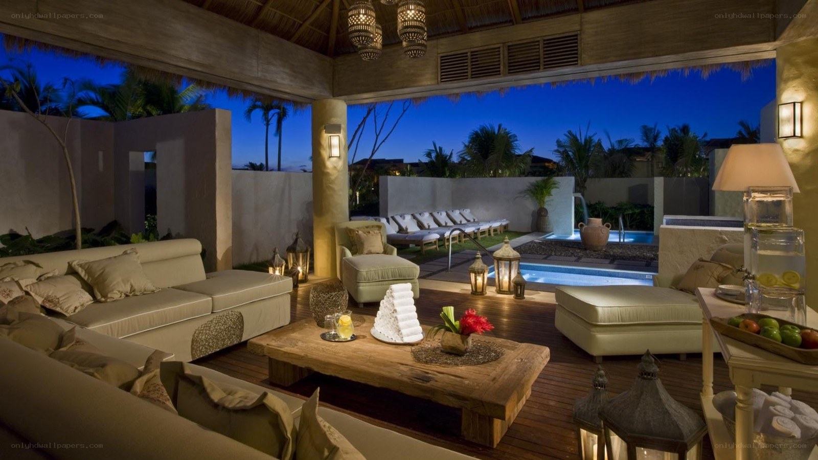 luxury poolside lounge at dusk