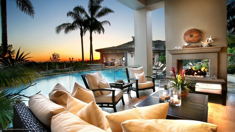 Luxury poolside lounge at sunset