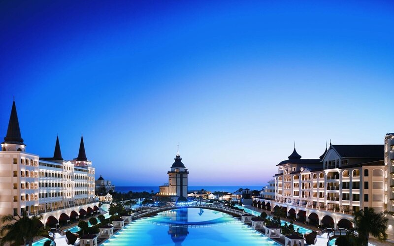 Luxury Resort at Dusk — Blue, Serene, Night, Photograph, Pool, Buildings, Ocean