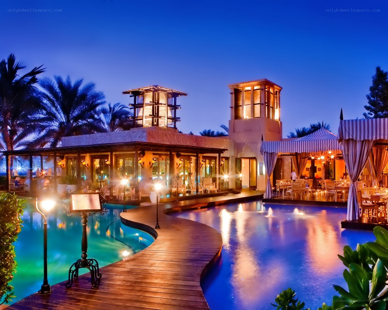 luxury resort pool at dusk