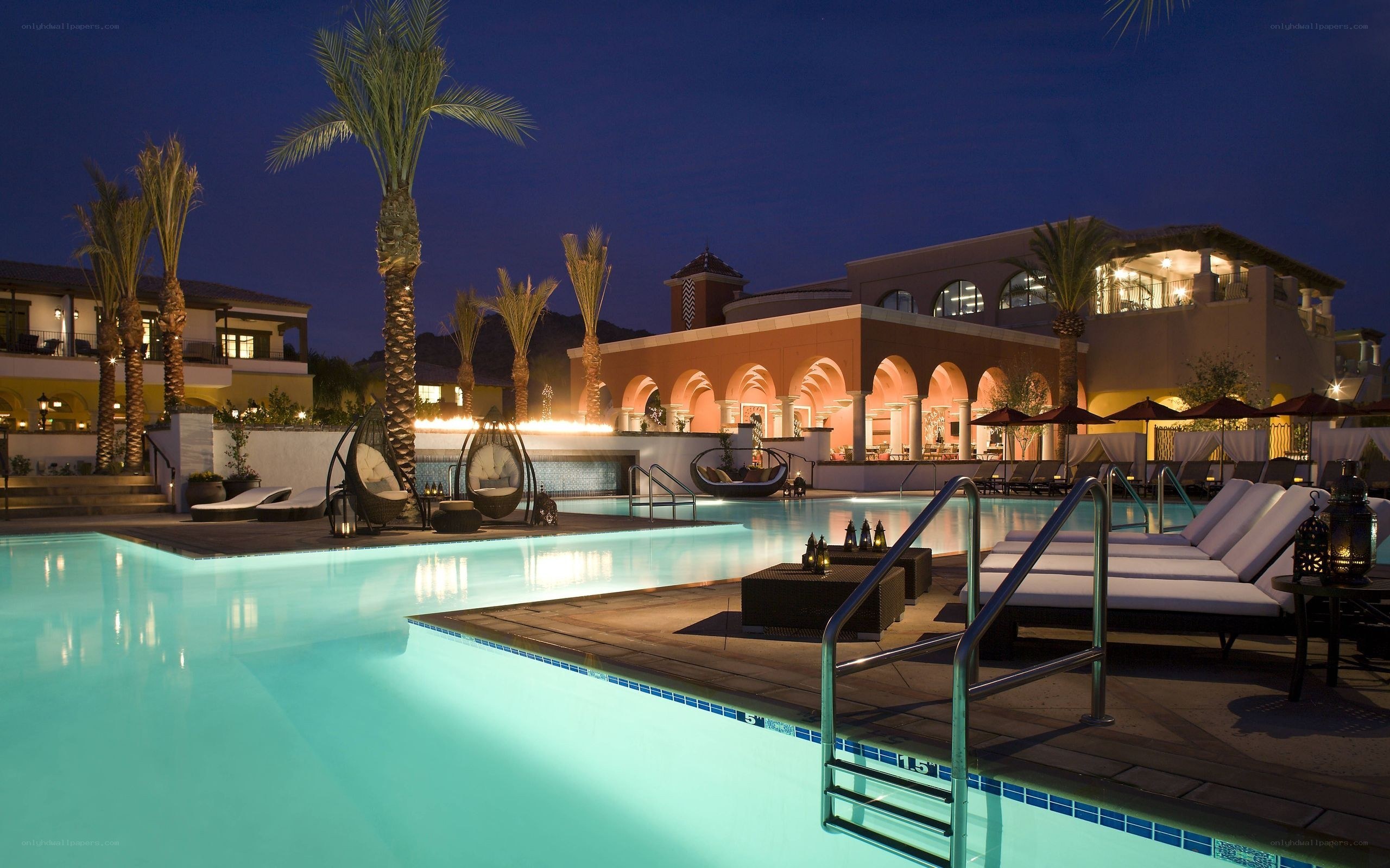 luxury resort pool at night