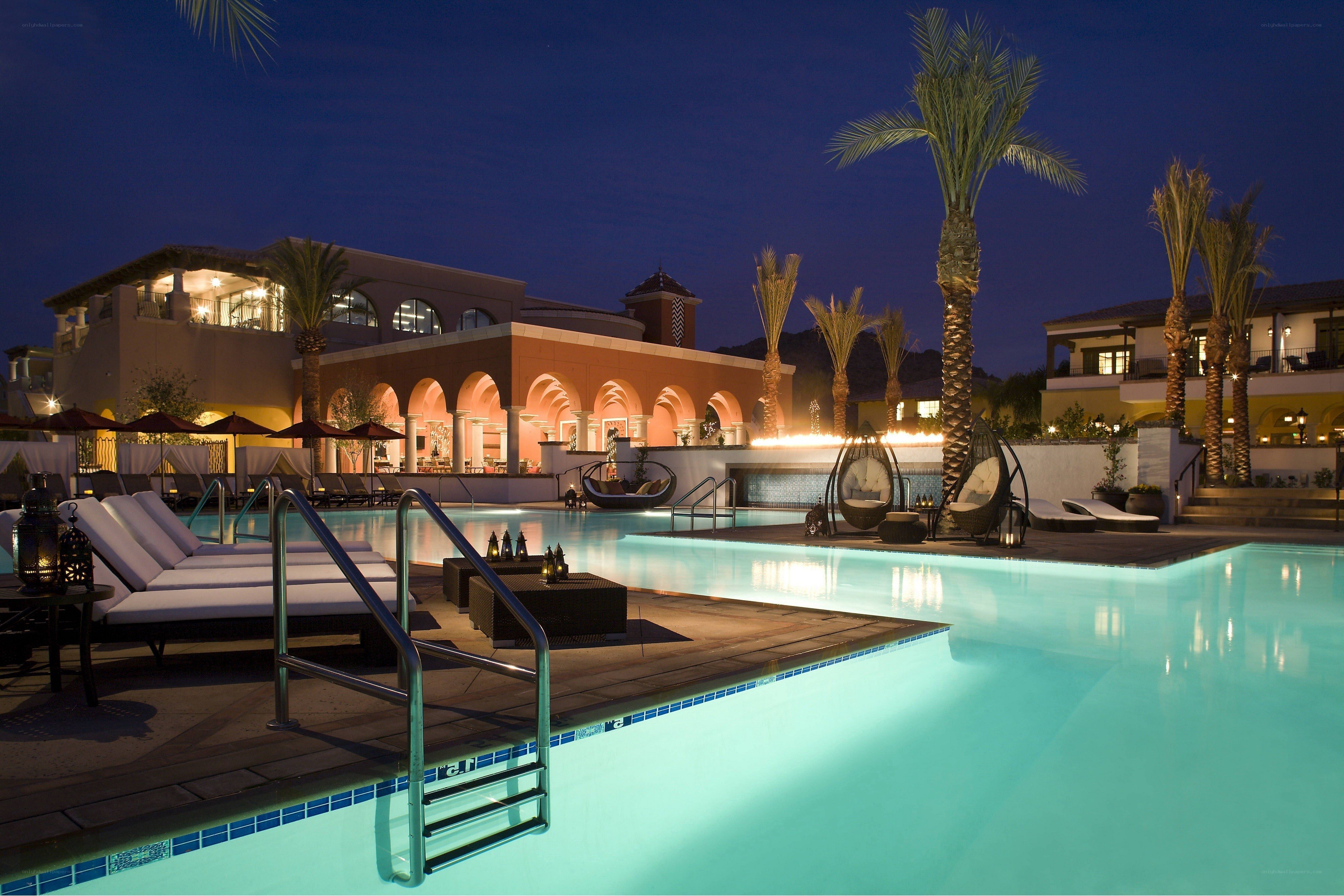 luxury resort pool at night