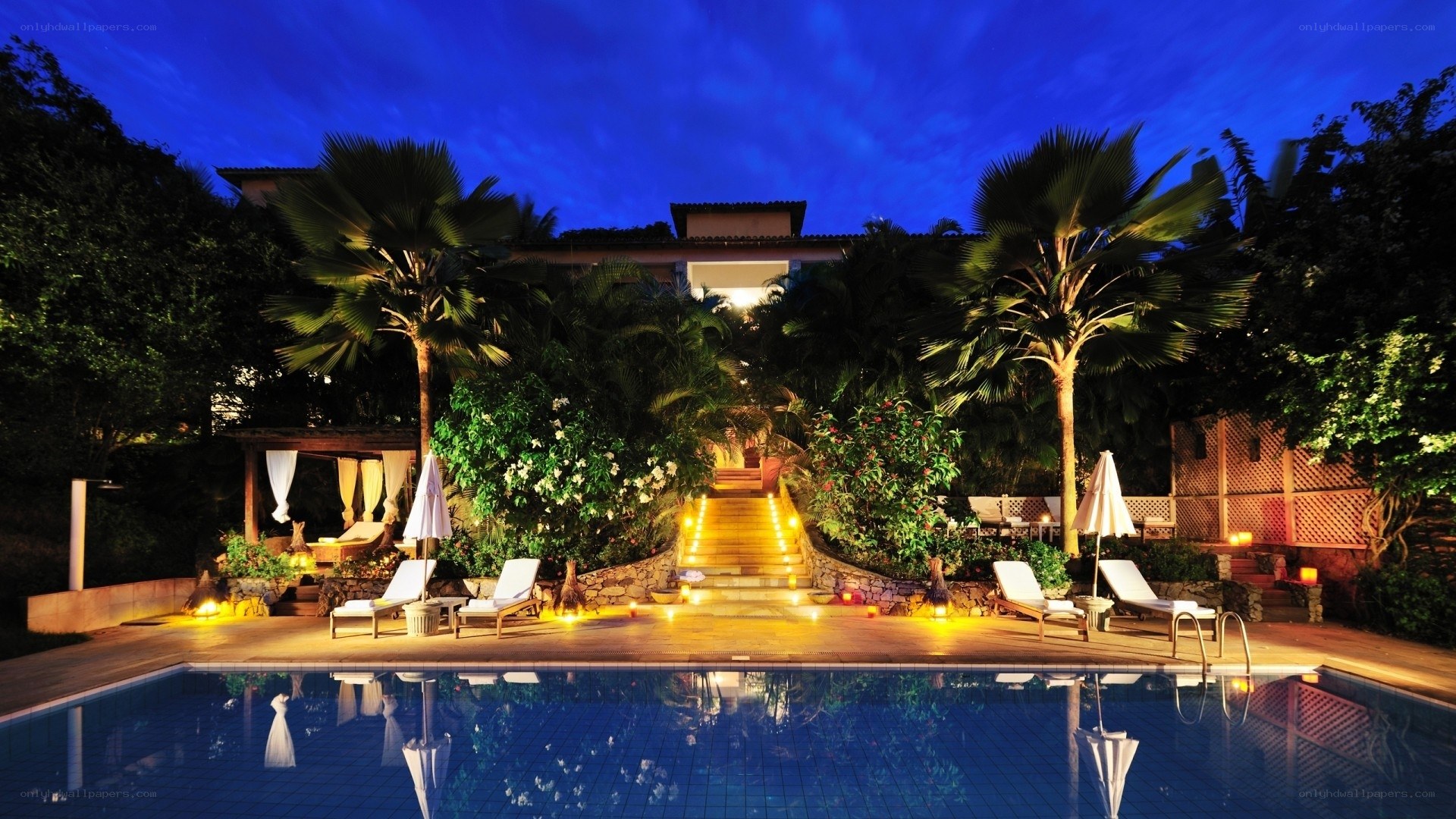 Luxury resort pool at night