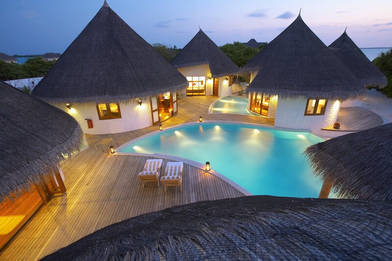 Luxury resort villas at dusk