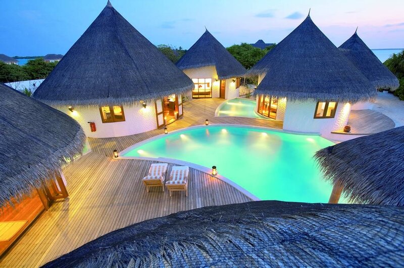 Luxury resort villas at dusk