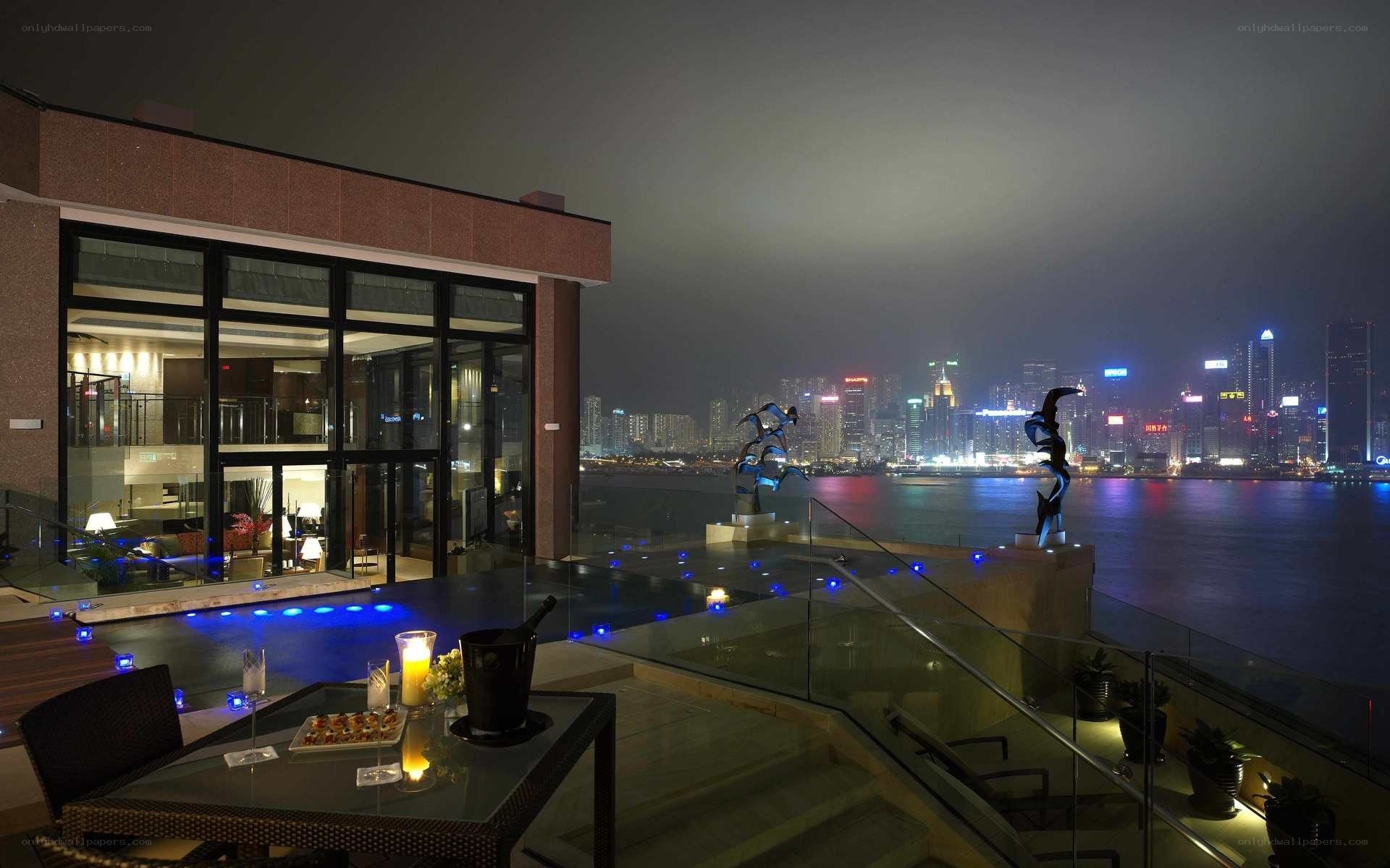 Luxury rooftop terrace at night
