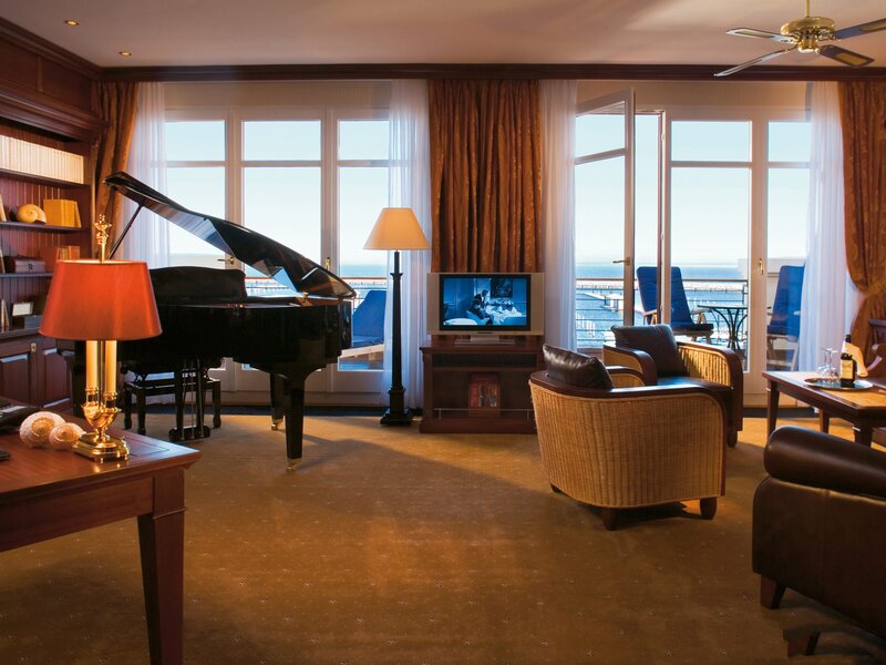 Luxury room with piano and ocean view