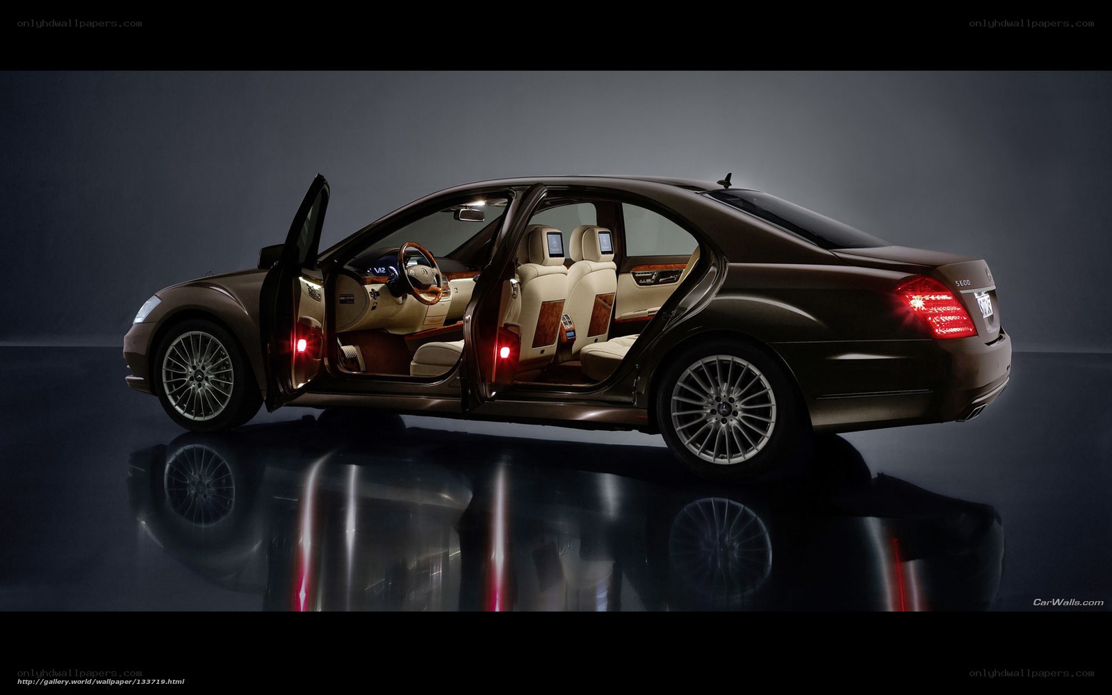 luxury sedan with open doors