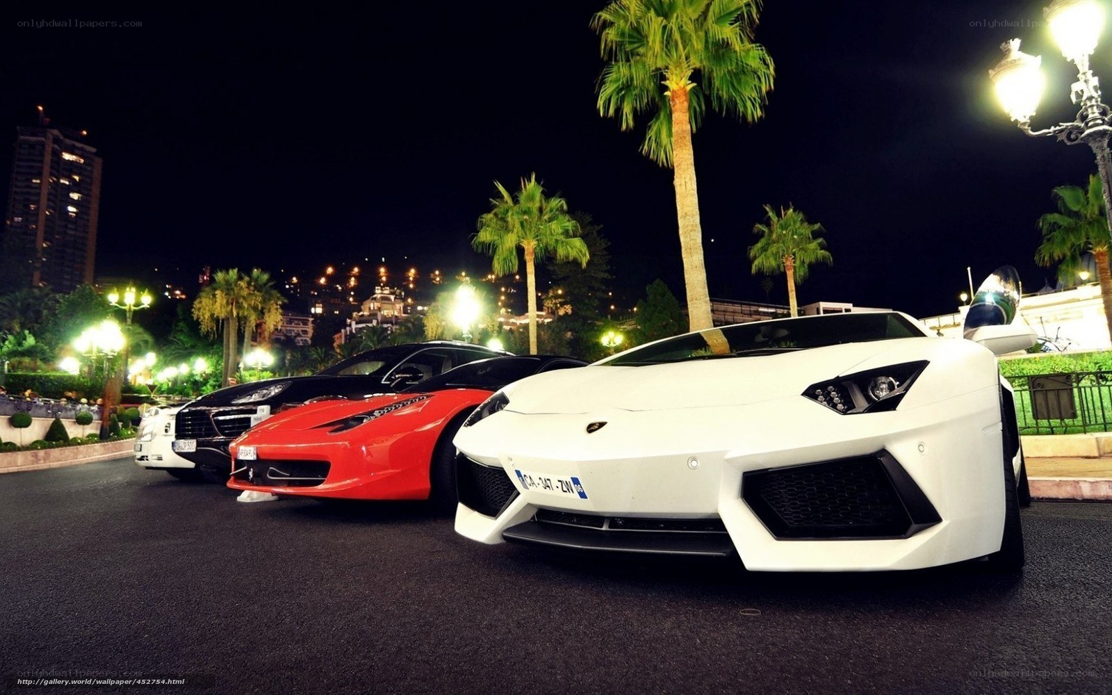 Luxury sports cars at night