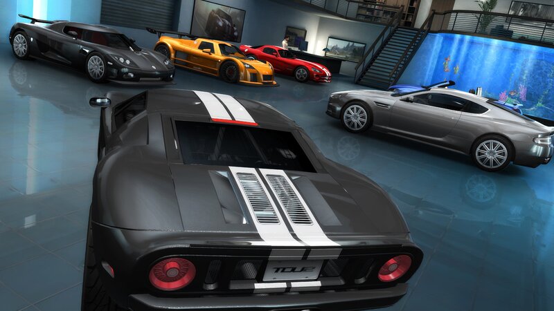 luxury sports cars in a garage