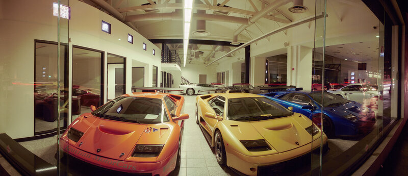 Luxury Sports Cars in Showroom — Orange