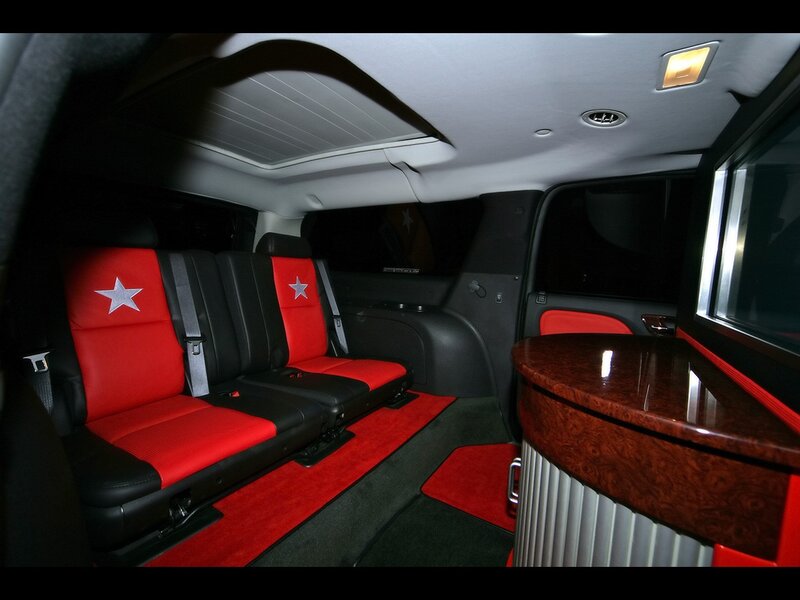 luxury vehicle interior with red seats