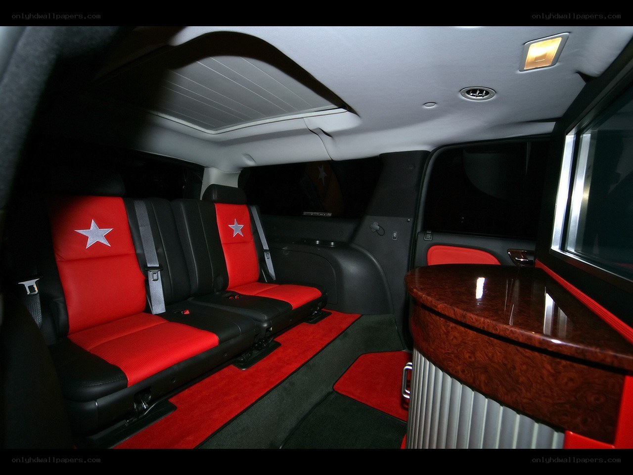 luxury vehicle interior with red seats