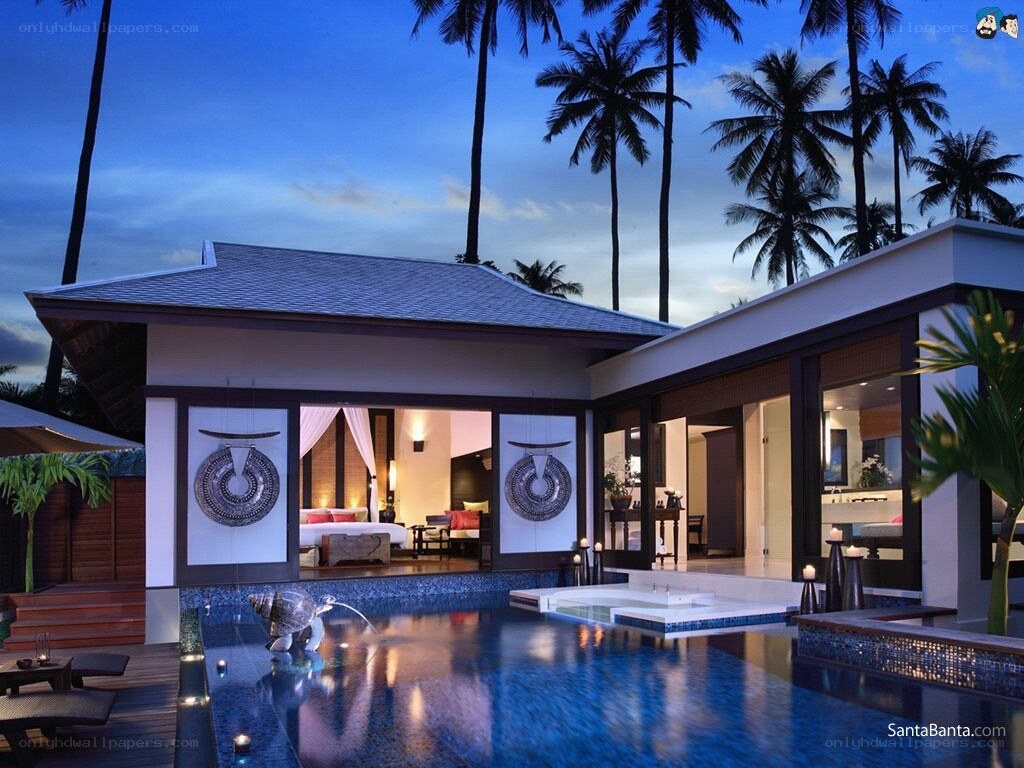 Luxury villa with pool at dusk