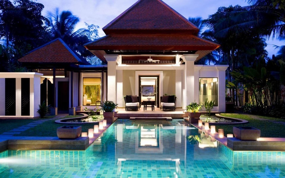 Luxury villa with pool at dusk