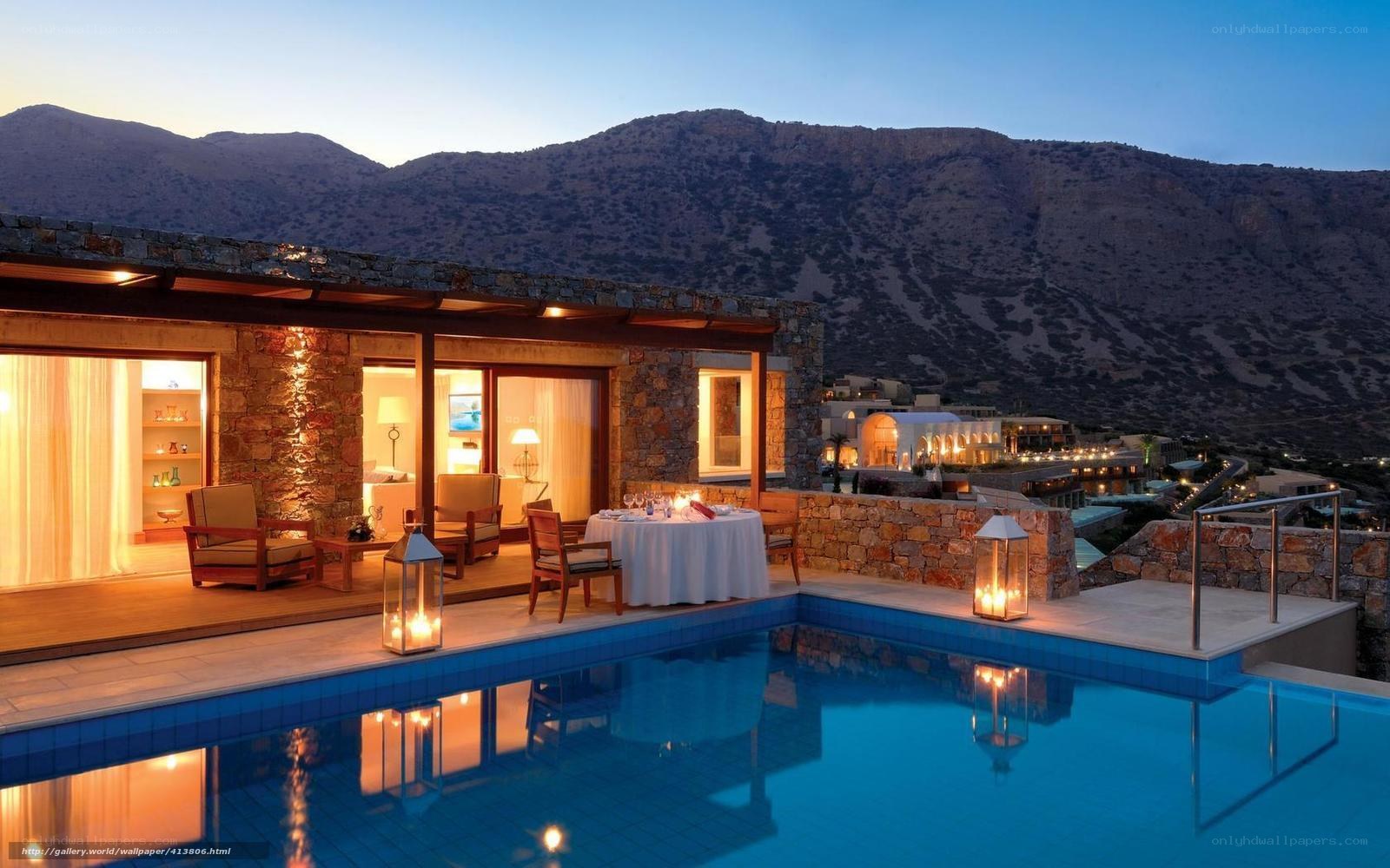 Luxury villa with pool at dusk