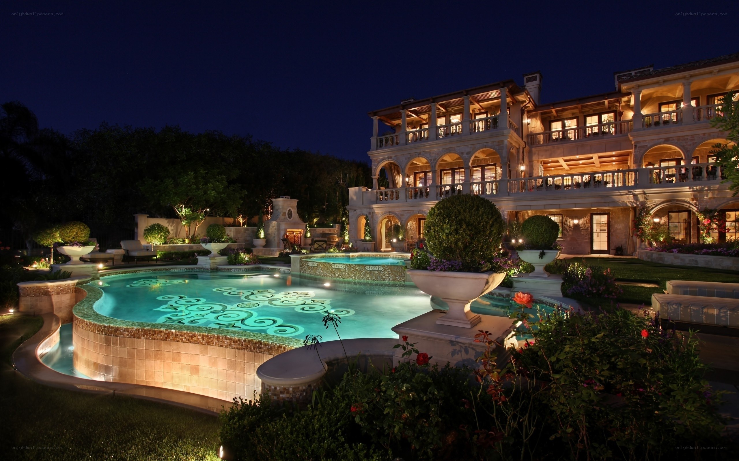 luxury villa with pool at night