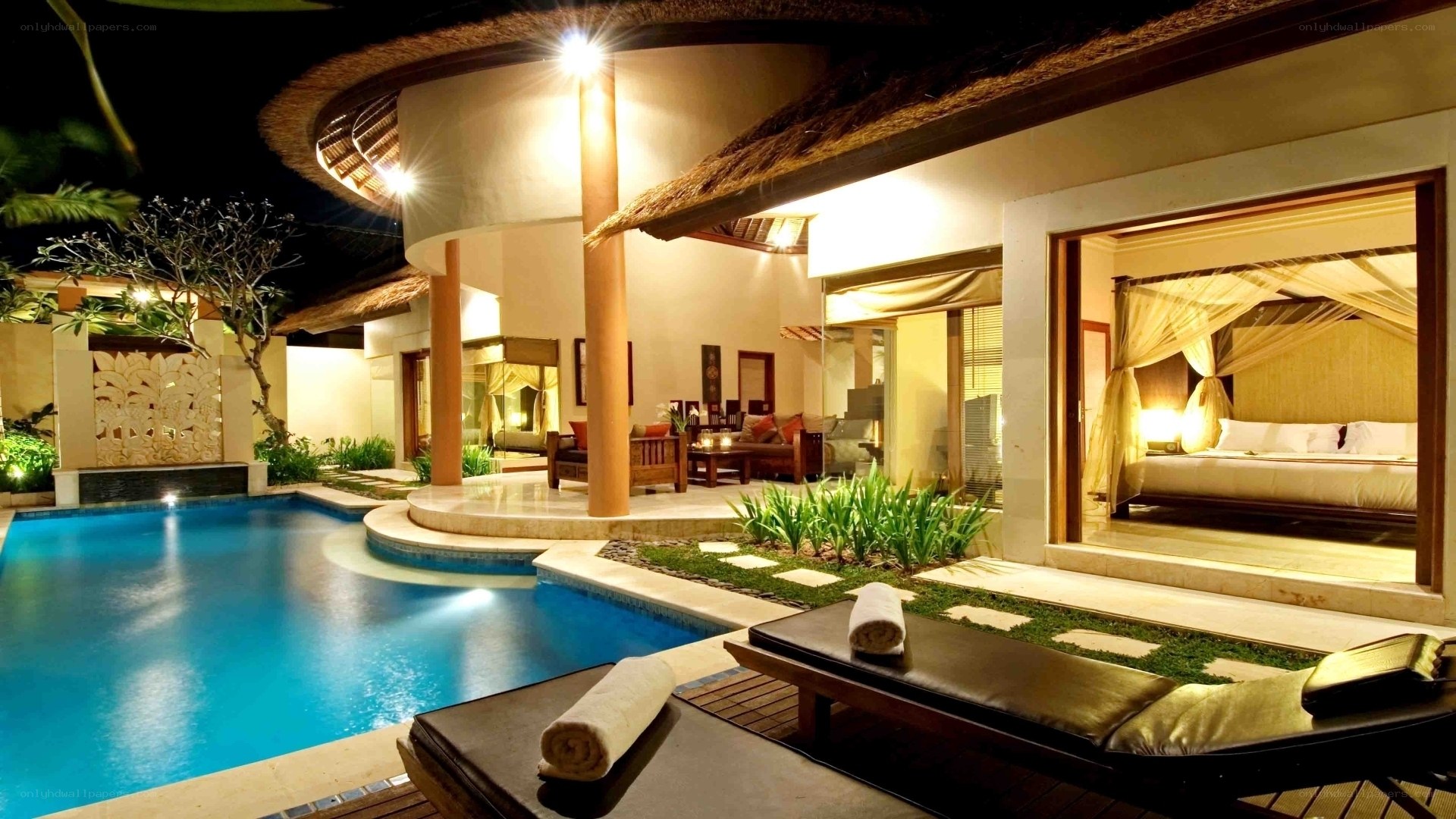 Luxury villa with pool at night