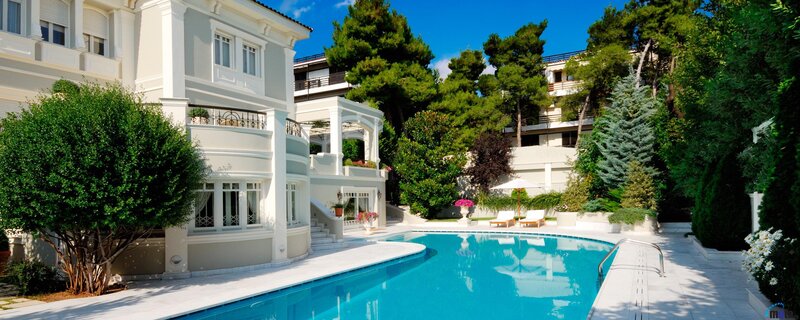 Luxury Villa with Pool — Blue, Serene, Afternoon, Photograph, Trees, Building