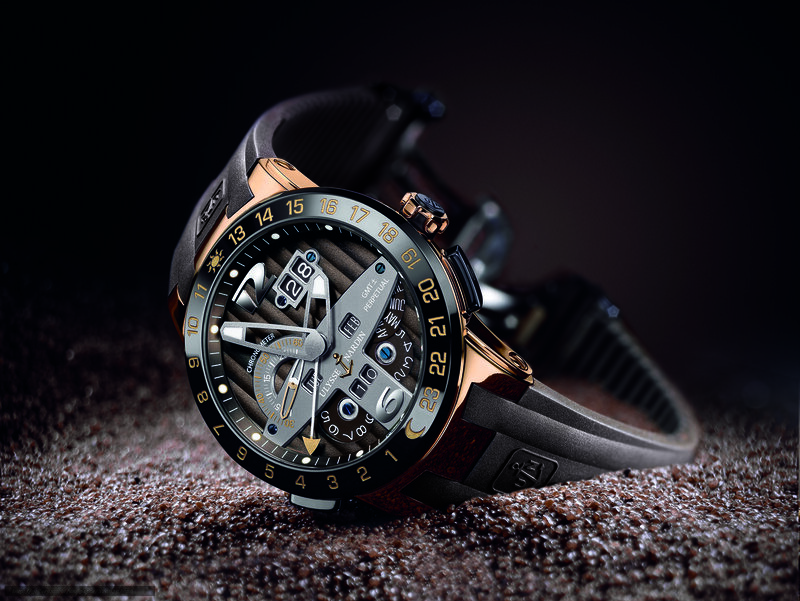 Luxury watch on textured surface