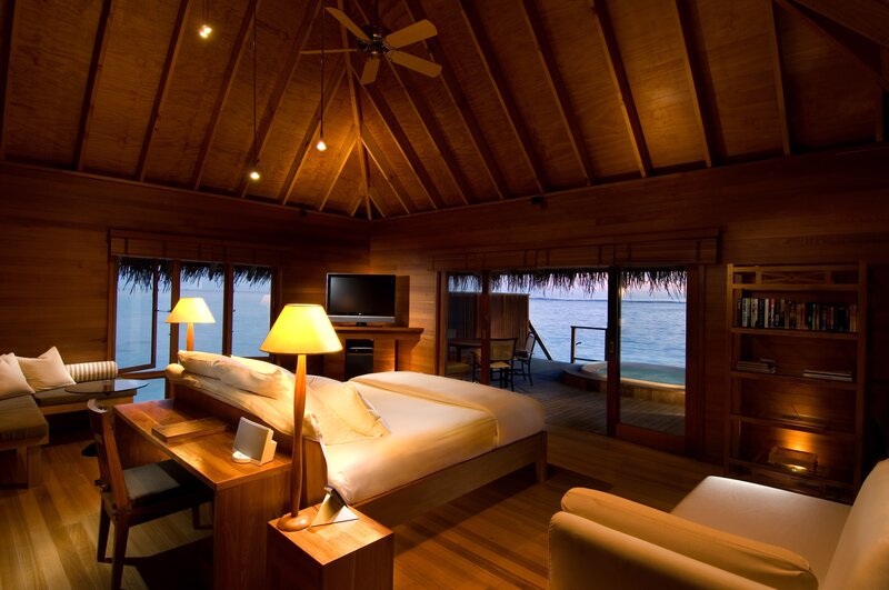 Luxury wooden bedroom with ocean view