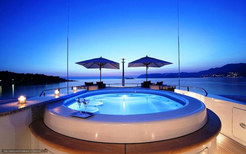 Luxury yacht hot tub at dusk