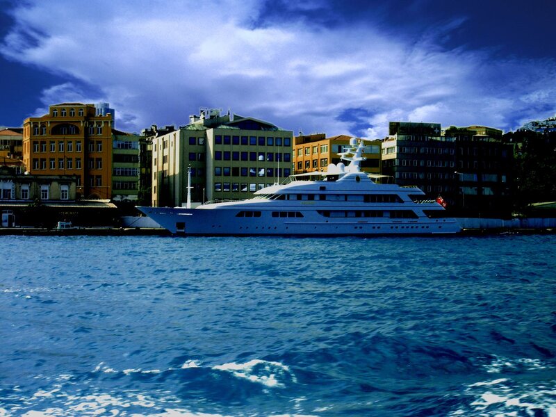Luxury yacht in city harbor