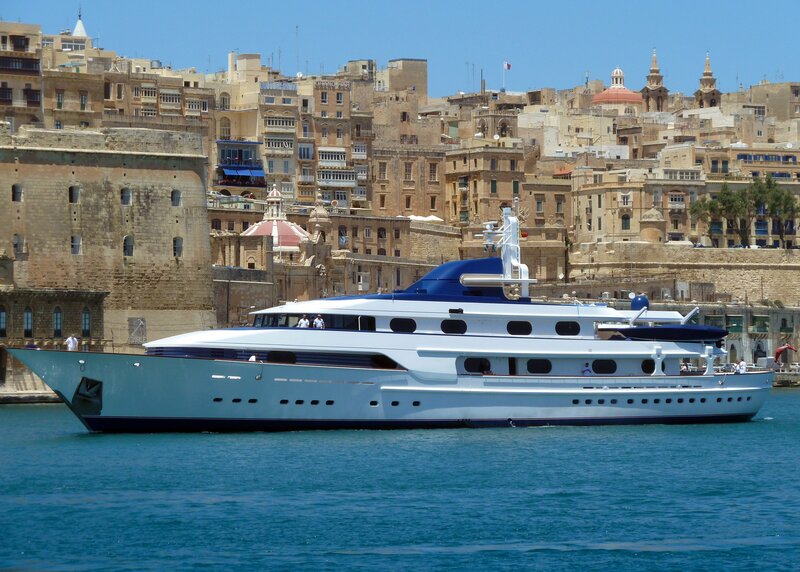 Luxury yacht in historic harbor