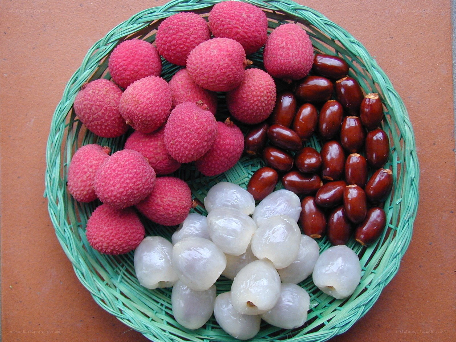 lychees and dates in a basket