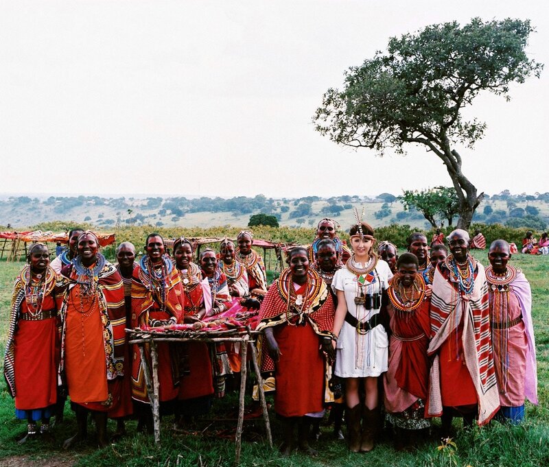 Maasai women with visitor
